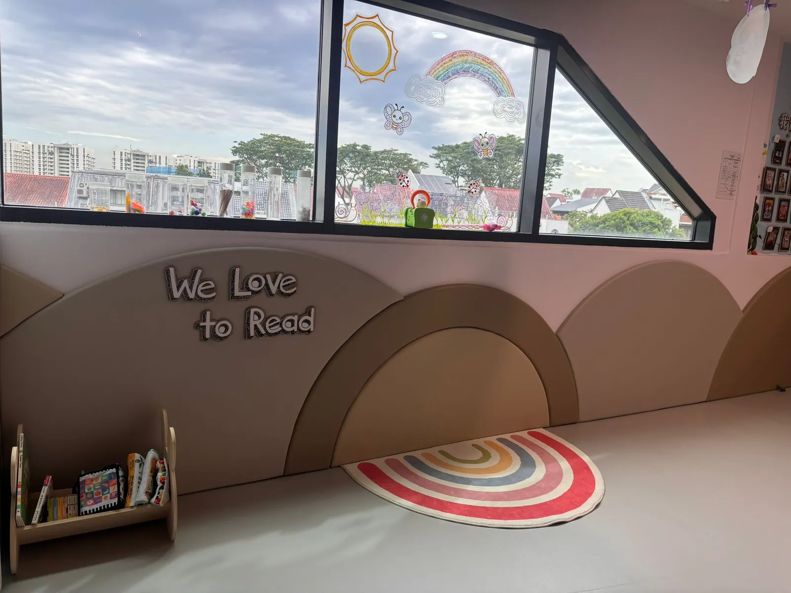 The wide infant care room with lantern lighting and cosy cot nooks